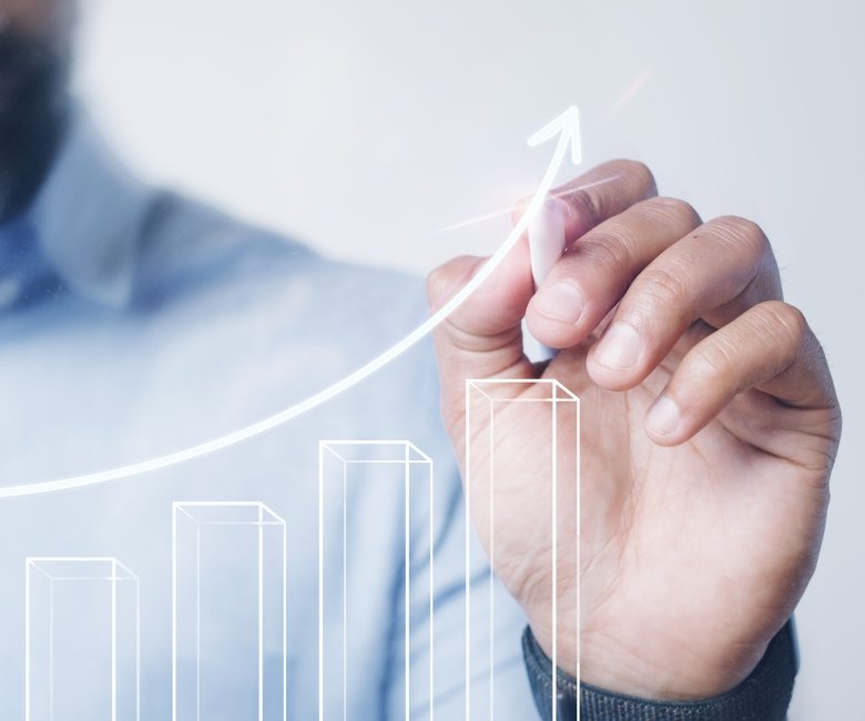 Man giving a bar graph presentation using a high technology digital pen